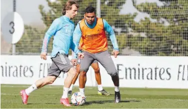  ?? Courtesy: Real Madrid Twitter ?? Real Madrid players take part in a ↑ training session on Friday.