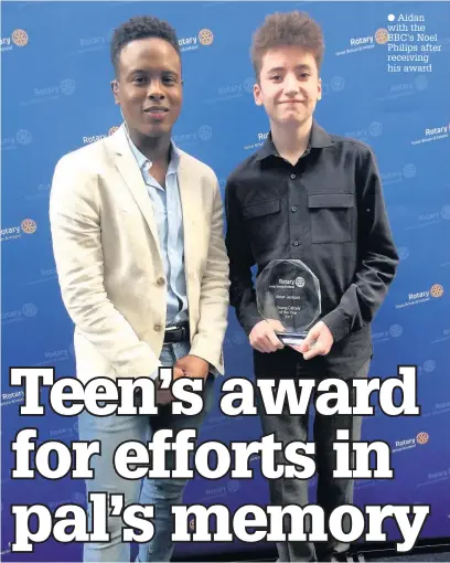  ??  ?? Ivan Duniak with his first belt
Aidan with the BBC’s Noel Philips after receiving his award