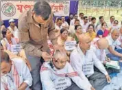  ?? PTI FILE ?? Activists of Brihattar Asomiya Yuva Manch had their heads shaved as a mark of protest against the Citizenshi­p Bill in Guwahati.