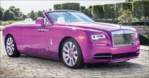  ??  ?? Rolls Royce Dawn in Fuxia