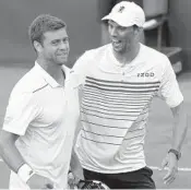  ?? DARKO BANDIC/AP ?? Mike Bryan, right, and Ryan Harrison of the U.S. celebrate after defeating Croatia’s Ivan Dodig and Mate Pavic.