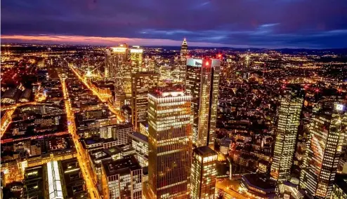  ?? ?? The buildings of the banking district are seen after the sun set in Frankfurt, Germany, February 2020.