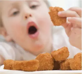  ?? Getty Images ?? Chicken nuggets are often one of the few options at children’s parties