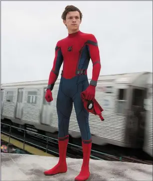  ??  ?? Tom Holland as Peter Parker/Spider-Man in Spider-Man:Homecoming.