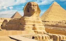  ??  ?? Movie set . . .The Great Sphinx. The pyramids of Menkaure and Khafre in the background.