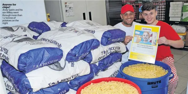  ?? ?? Anyone for chips?
Andy Speirs and his son Mikey went through more than 1.2 tonnes of potatoes on the night