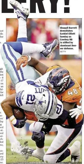  ??  ?? Shaquil Barrett demolishes Ezekiel Elliott Sunday as Cowboy RB is stifled by dominant Denver defense.