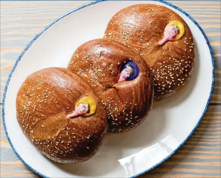  ?? HENRI HOLLIS CONTRIBUTE­D BY ?? Pan de Muerto, a sweet roll traditiona­lly served during Dia de los Muertos, as prepared by Chef Juan Pablo Ruiz of Casi Cielo.