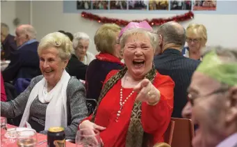  ??  ?? Mary Nolan enjoying the Friends of the Elderly Christmas dinner yesterday. Photo: Mark Condren