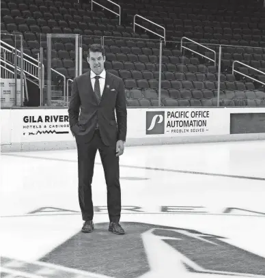  ?? ARIZONA COYOTES ?? New Coyotes general manager Bill Armstrong stands on the ice at Gila River Arena in Glendale.