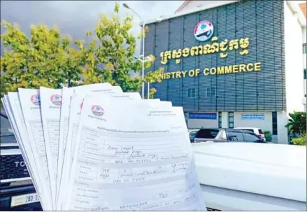  ?? FB ?? Company registrati­on forms are held outside the commerce ministry in October 2022.