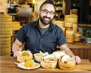  ?? PHOTOS: ERROL McGIHON ?? Gongfu Bao chef-owner Tarek Hassan started with a food cart in 2013 before moving into his bricks-and-mortar location.