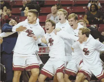  ?? STAFF PHOTO BY NICOLAUS CZARNECKI ?? SCREAMING EAGLES: The Boston College bench erupts after a spectacula­r play by guard Ky Bowman against Dartmouth yesterday at Conte Forum.