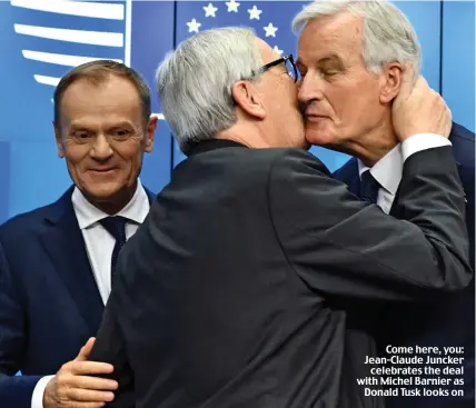  ??  ?? Come here, you: Jean-Claude Juncker celebrates the deal with Michel Barnier as Donald Tusk looks on