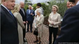  ??  ?? Joe and Jill Biden speak with Queen Elizabeth II at a reception with G7 leaders