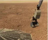  ??  ?? The Phoenix Mars Lander’s robot arm scoops a sample for its Optical Microscope