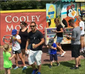  ?? MICHAEL GWIZDALA - MEDIANEWS GROUP ?? People enjoy the first-ever Food Truck Festival Saturday at Joseph L. Bruno Stadium.