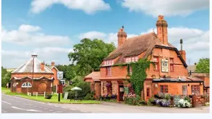  ??  ?? The Stag’s Head pub in Burwell, on the A16, with the roundhouse next door; formerly The Buttercros­s.