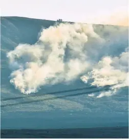  ?? Vincent Cole ?? Photograph of a fire on Winter Hill