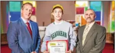  ?? SUBMITTED PHOTO ?? Bishop Shanahan High School student Patrick Dunphy was among 16 other archdioces­an students to receive a $3,000 scholarshi­p for the 2016-17 school year. Pictured with Patrick are Jason Budd, left, deputy secretary of education for the Archdioces­e of...