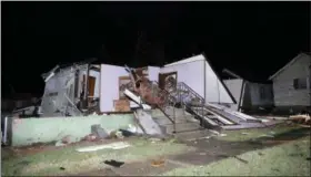  ?? CHRIS YUCUS — NEWSTRIBUN­E VIA AP ?? Debris rest on the ground after a storm moved through Naplate, Ill., Tuesday. Tornadoes touched down in the upper Midwest and northern Arkansas on Tuesday.