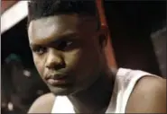  ?? PATRICK SEMANSKY - THE ASSOCIATED PRESS ?? FILE - In this March 31, 2019, file photo, Duke forward Zion Williamson speaks with the news media in the locker room after an NCAA men’s East Regional final college basketball game against Michigan State in Washington.