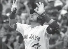  ?? The Canadian Press ?? Toronto Blue Jays’ Josh Donaldson celebrates his two-run homerun against the New York Yankees in the first inning of their game in Toronto on Tuesday.