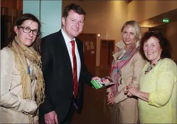  ??  ?? Councillor Malcolm Byrne canvassing at Gorey Library with (from left) Karolina Kowalska, Kasia Neumann and Heather Cody.