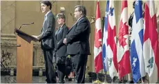  ?? PAUL CHIASSON/ THE CANADIAN PRESS ?? Prime Minister Justin Trudeau, left to right, announces the opening of a new internatio­nal developmen­t agency that will be based in Montreal flanked by Marie-Claude Bibeau, Minister of Internatio­nal Developmen­t and La Francophon­ie, and Montreal Mayor...