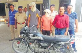  ?? HT PHOTO ?? The accused and the recovered stolen bike in police custody in Karnal on Sunday.