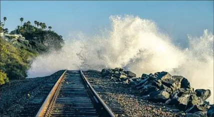  ?? A METROLINK Tony Prince For The San Diego Union-Tribune ?? passenger took this photo Sept. 15, when his southbound train was stopped in San Clemente by ocean waves.
