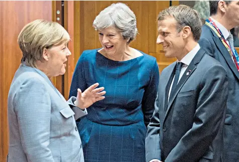  ??  ?? Mrs May’s meetings with Angela Merkel and Emmanuel Macron, above, and Jean-claude Juncker, top left, were reportedly not as they seemed
