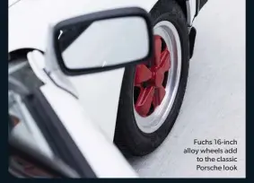  ??  ?? Fuchs 16-inch alloy wheels add to the classic Porsche look