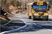  ?? Ned Gerard/Hearst Connecticu­t Media file photo ?? A school bus drives south on West Rocks Road, in Norwalk, last month. Norwalk ranked fifth for student concussion­s in Connecticu­t last year. Experts say it's due to better reporting