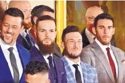  ?? MICHAEL COLEMAN/JOURNAL ?? Albuquerqu­e native Alex Bregman, in the plaid jacket, and his Houston Astros teammates were recognized by president Donald Trump at the White House Monday for winning the World Series in 2017.