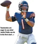  ?? AP ?? Teammates are eager to see what Justin Fields can do in his first start.