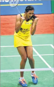  ??  ?? PV Sindhu celebrates her win over Saina Nehwal in the quarterfin­al match of the Yonex-Sunrise India Super Series badminton tournament at the Siri Fort Sports Complex in New Delhi on Friday.