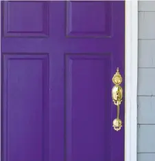  ??  ?? Purple is an unexpected and elegant choice for your front door.
