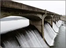  ?? BILL UHRICH — READING EAGLE ?? Water rushes over the spillway at Lake Ontelaunee.