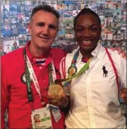  ??  ?? Billy Walsh with Olympic gold medal winner Claressa Shields