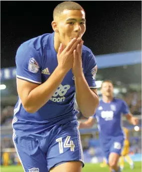  ??  ?? > Che Adams celebrates his equaliser for Blues against Preston