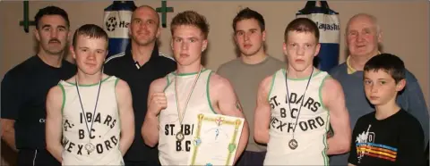  ??  ?? The St. Ibar’s-St. Joseph’s contingent after the Leinster youths championsh­ips (from left): Billy Walsh (coach), Joe Bridges (runner-up), Damien Godkin (coach), Darren Butler (Leinster champion), Tomás Whelan (coach), Barry O’Neill (runner-up), Liam Walsh R.I.P. (coach), Ryan Walsh.