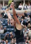  ?? ANDRES KUDACKI — THE ASSOCIATED PRESS ?? Anastasija Sevastova, of Latvia, celebrates after defeating Maria Sharapova, of Russia, during the fourth round of the U.S. Open tennis tournament, Sunday in New York.