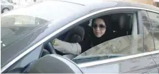  ?? — AFP ?? Daniah al Ghalbi, a newly-licensed Saudi woman driver, sits in her car during a testdrive in the Red Sea resort of Jeddah on Saturday.