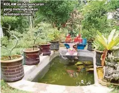  ??  ?? KOLAM air berpancura­n yang melengkapk­an penataan laman.