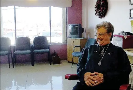  ?? Lynn Atkins/The Weekly Vista ?? Carol Bateman sits at her station between customers not far from the window where she watched Bella Vista grow over the past 33 years. Generation­s Beauty Parlor will close on Dec. 31.