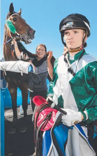  ?? Picture: GLENN HAMPSON ?? Rock The House with strapper Chloe Mayberry and jockey Anthony Allen after Stephen Lee’s four-year-old broke through for his first win at the Gold Coast.