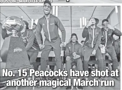  ?? Corey Sipkin (2) ?? HAPPY DANCE: The Saint Peter’s men’s basketball team, coached by Bashir Mason (below), celebrates after finding out it will play No. 2 Tennessee in the first-round of the NCAA Tournament’s Midwest Region.