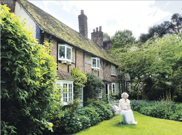  ??  ?? Actress Gemma Jones poses for a photo titled He’s Due Home by Dinner, part of Jessica Ennis and Caitlin Cronenberg’s new book The Endings.