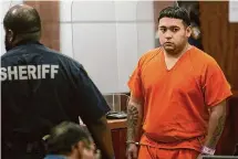  ?? Melissa Phillip/Staff Photograph­er ?? Hernan Torres Jr. appears in court on Wednesday. Hernan Torres Sr. and his two sons are charged with murder.